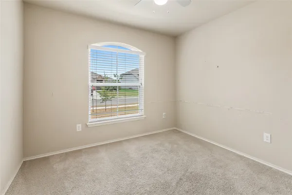 a room with furniture and a flat screen tv