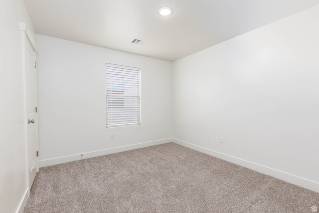 3157 Deseret Drive St. George, UT 84790 - Photo 16 of 24 Neutral tone carpeting complements the white walls and trim