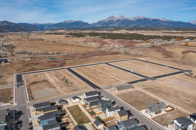 a view of an ocean with a mountain