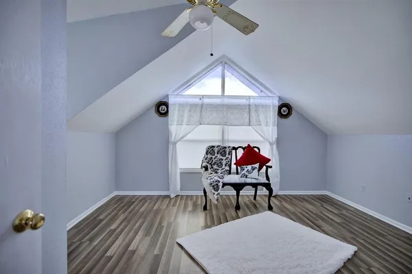 a room with furniture and a window