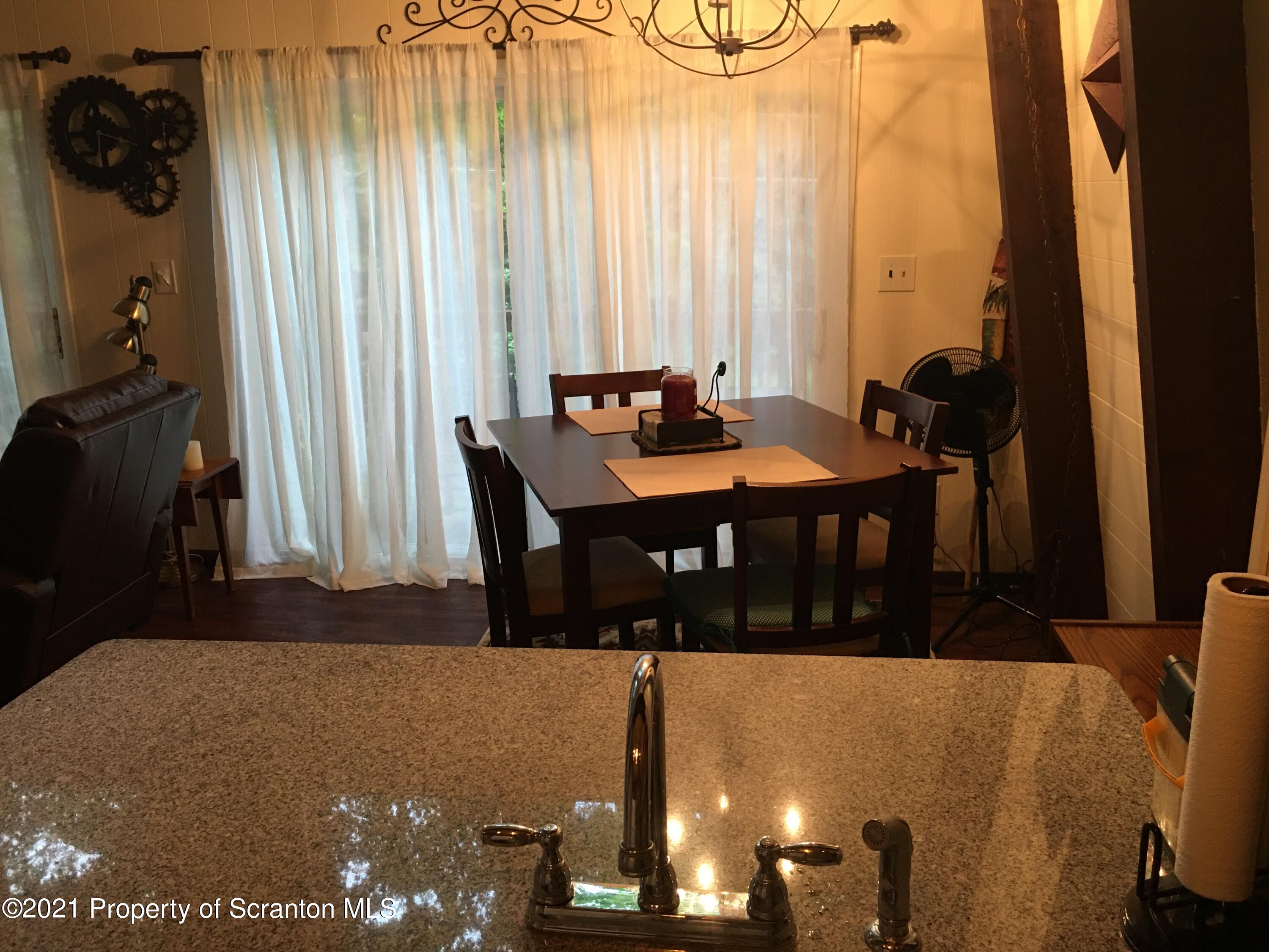 1635 Ridgeview Drive Lake Ariel, PA 18436 - Photo 3 of 24 a view of a dining room with furniture and a window