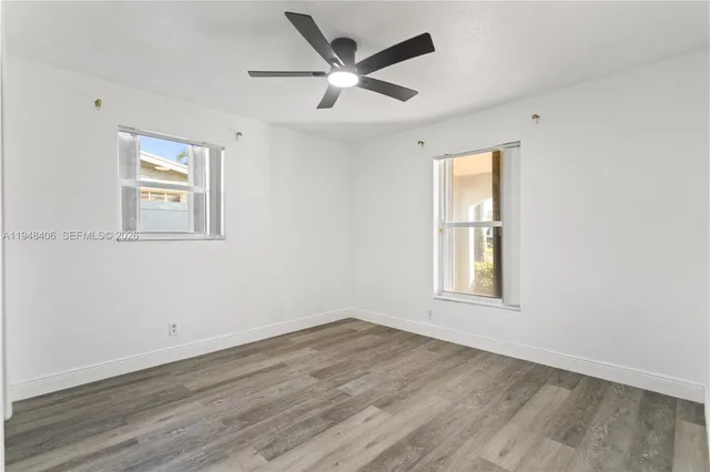 a view of a house with a street