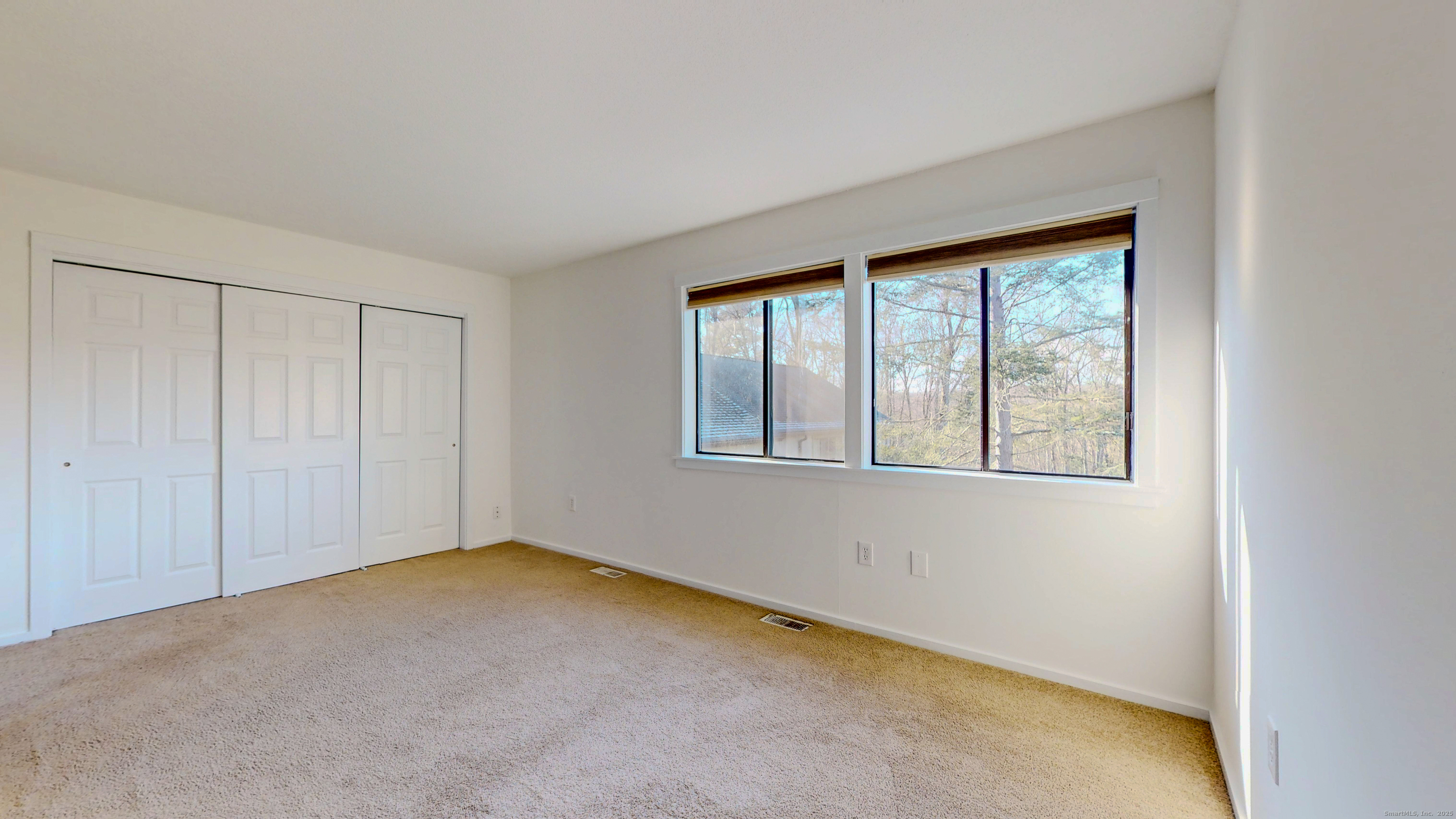 4 Fox Run, Unit 4 Woodbury, CT 06798 - Photo 13 of 25 a view of an empty room with a window