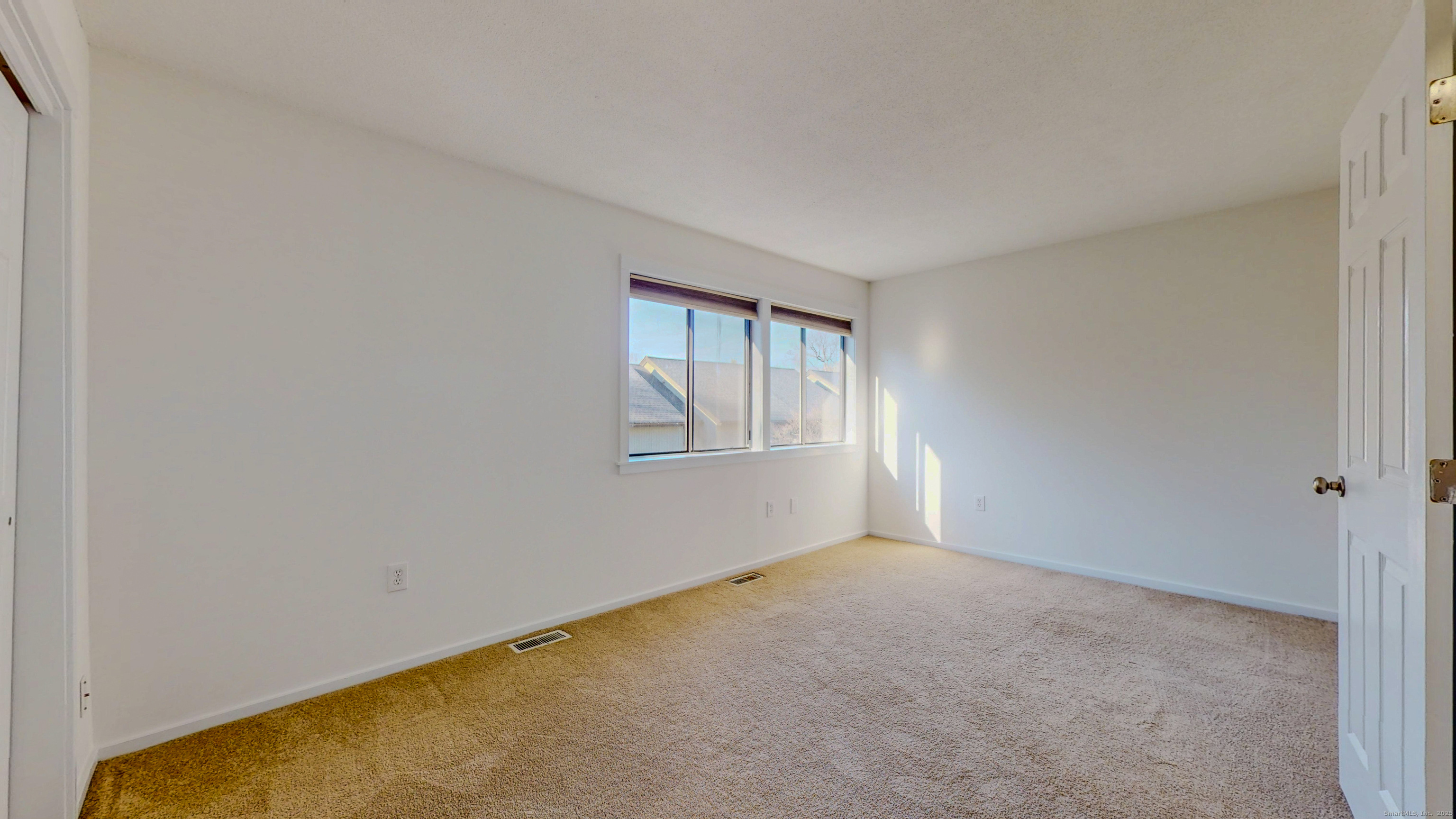 4 Fox Run, Unit 4 Woodbury, CT 06798 - Photo 14 of 25 a view of an empty room with a window