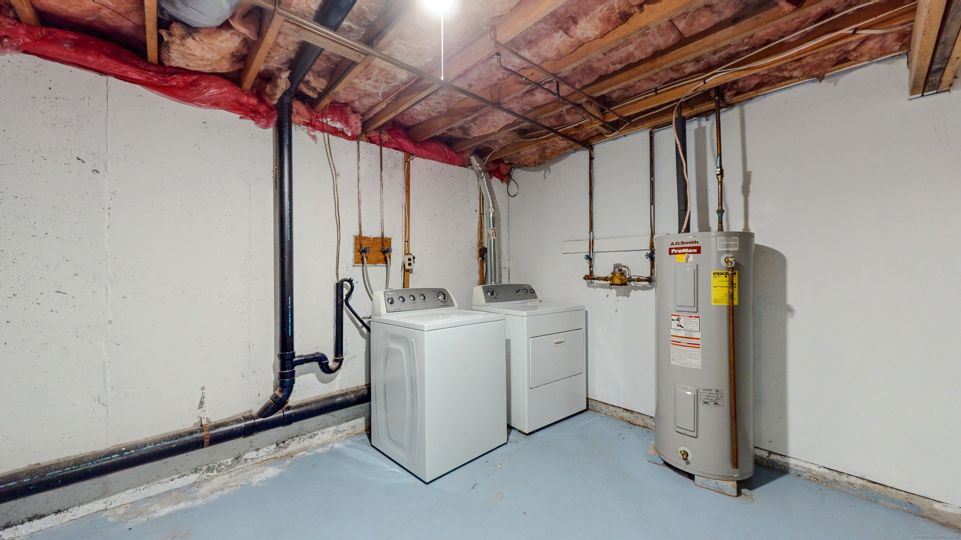 4 Fox Run, Unit 4 Woodbury, CT 06798 - Photo 19 of 25 a utility room with dryer and washer