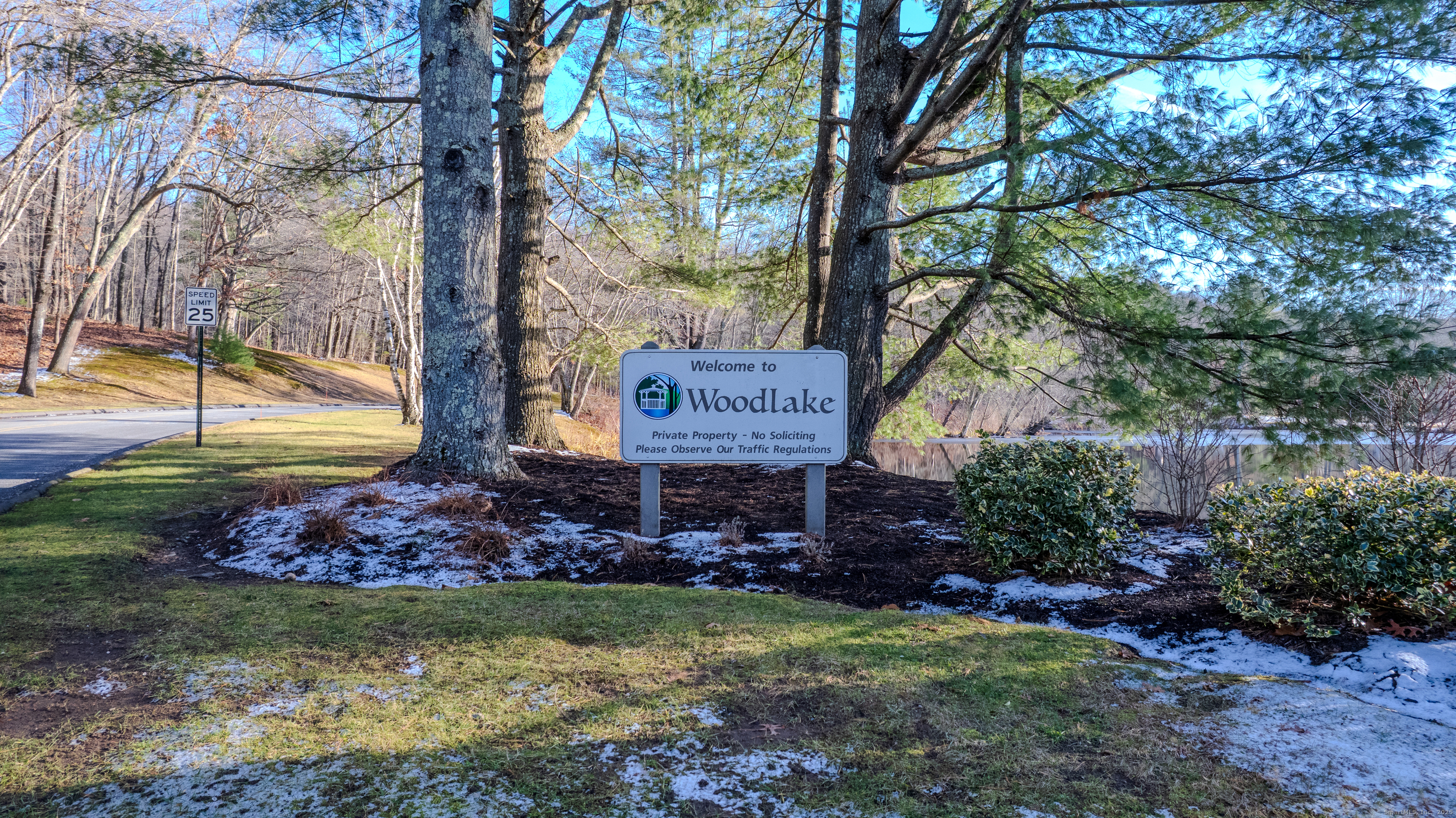 4 Fox Run, Unit 4 Woodbury, CT 06798 - Photo 24 of 25 a sign that is sitting in front of a tree