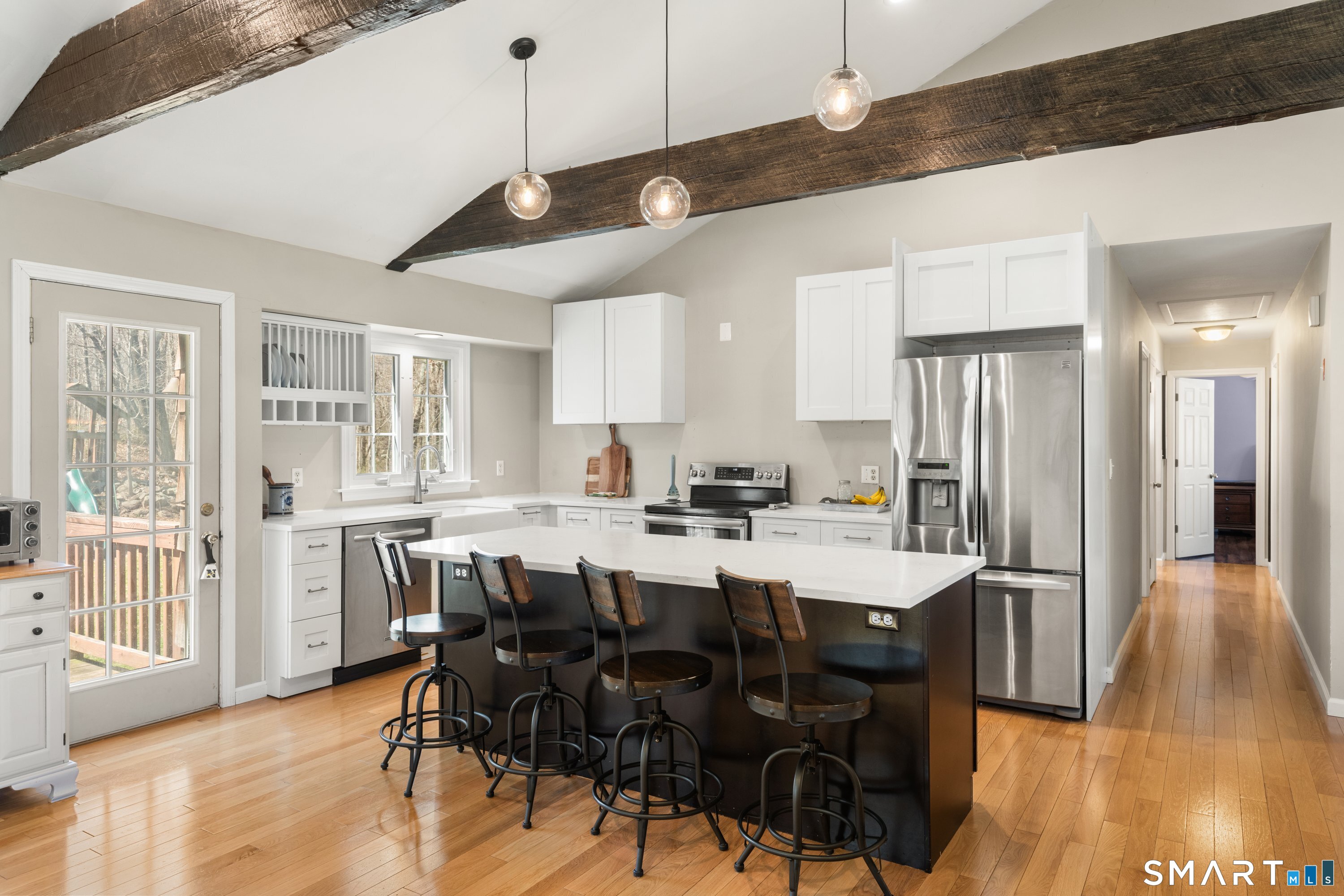 3 Pebble Road Newtown, CT 06470 - Photo 17 of 38 Beautifully renovated kitchen with oversized island offers plenty of workspace and additional dining seating- perfect home for hosting!!