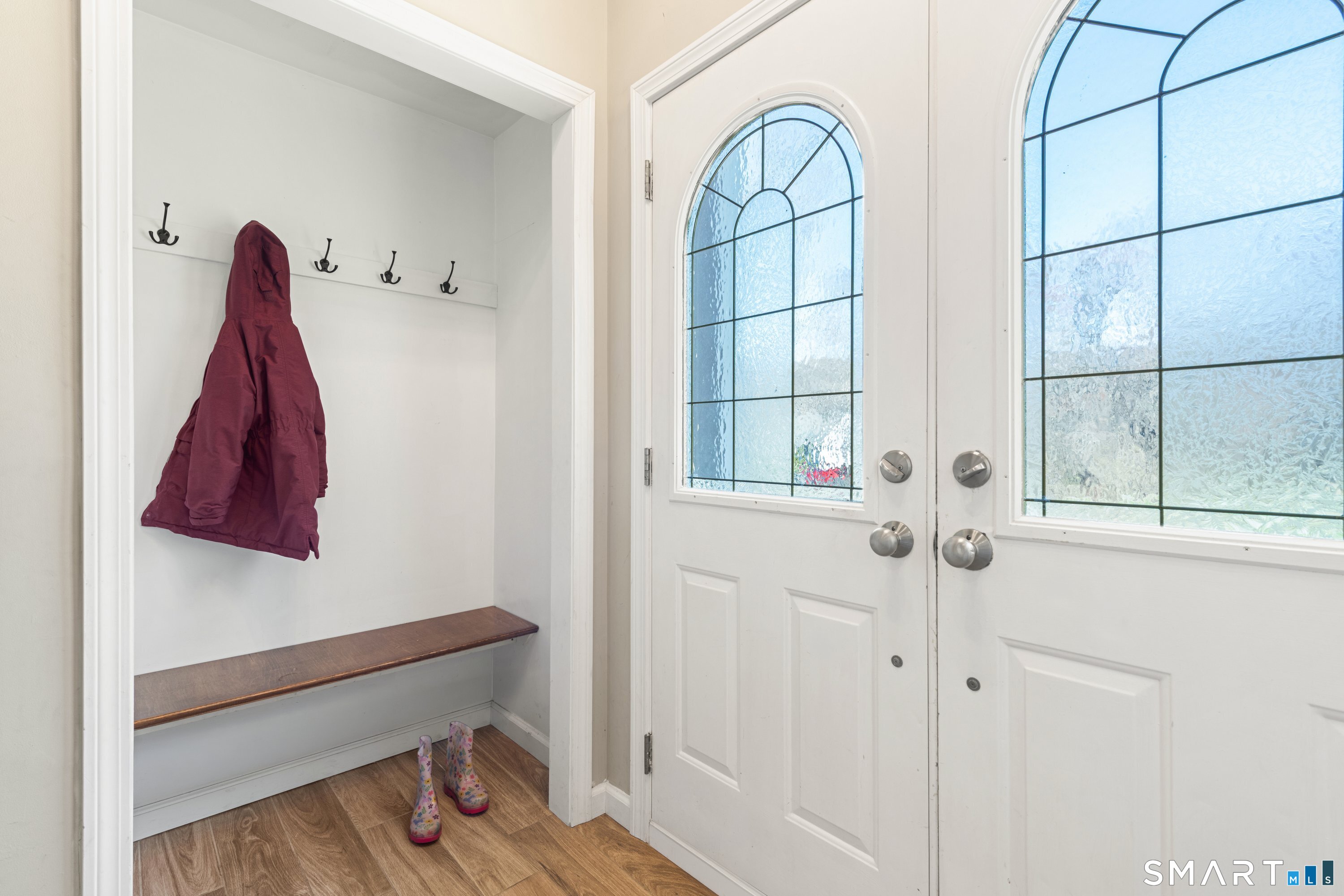 3 Pebble Road Newtown, CT 06470 - Photo 9 of 38 Roomy entryway with plenty of storage- has a 'drop zone' nook as well as a coat closet!