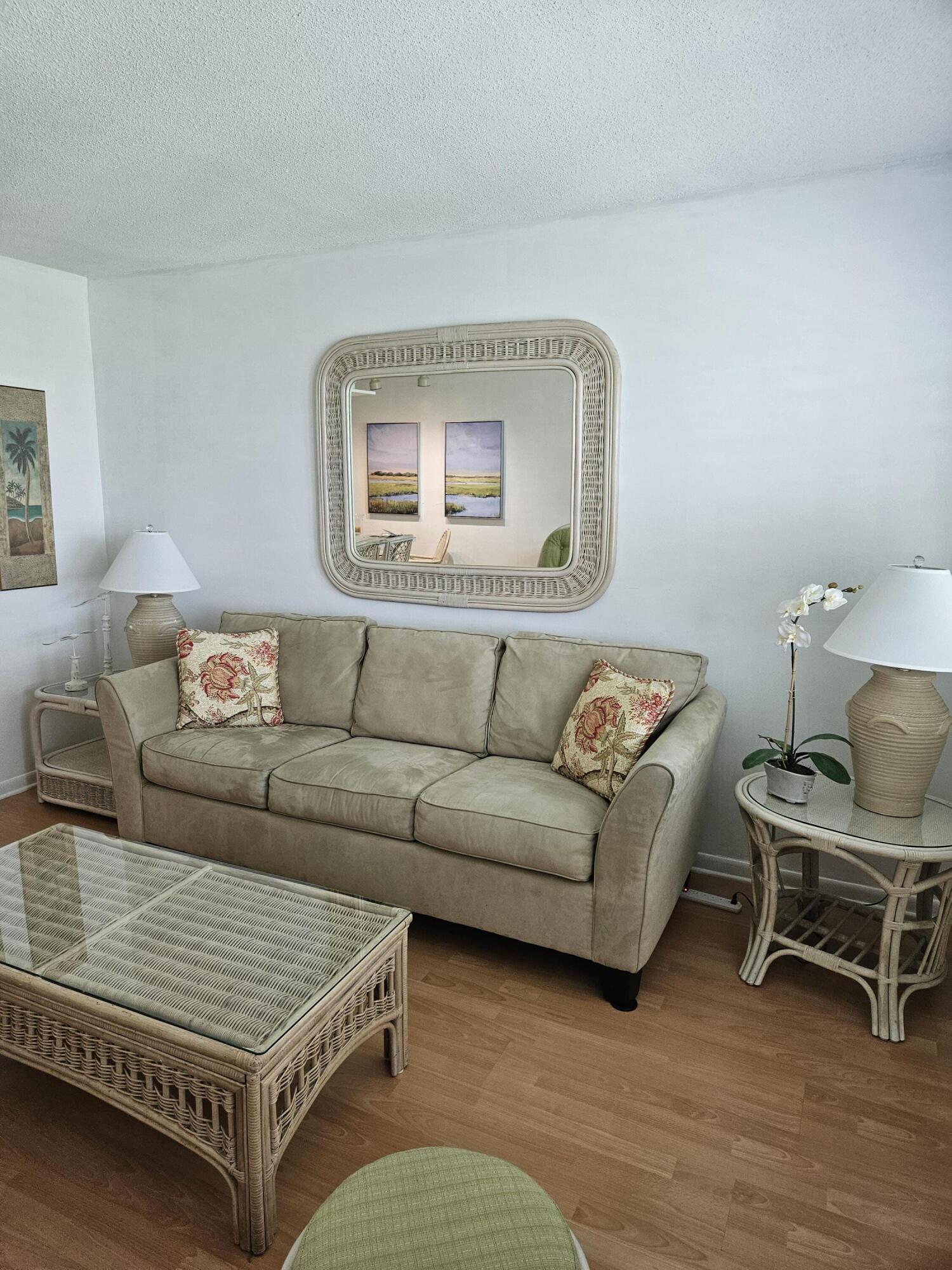 680 Horizon West, Unit 211 Boynton Beach, FL 33435 - Photo 2 of 6 a living room with furniture