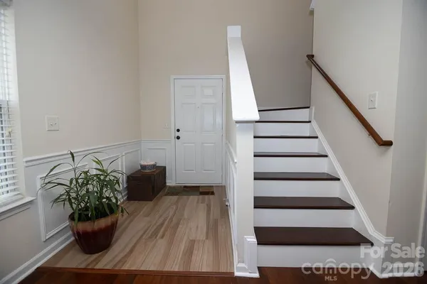 a view of entryway with stairs