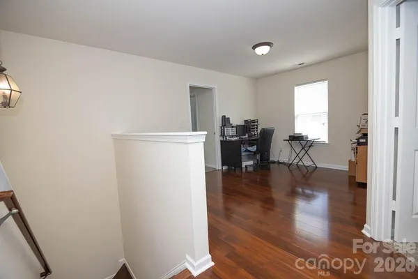a view of livingroom with furniture and wooden floor
