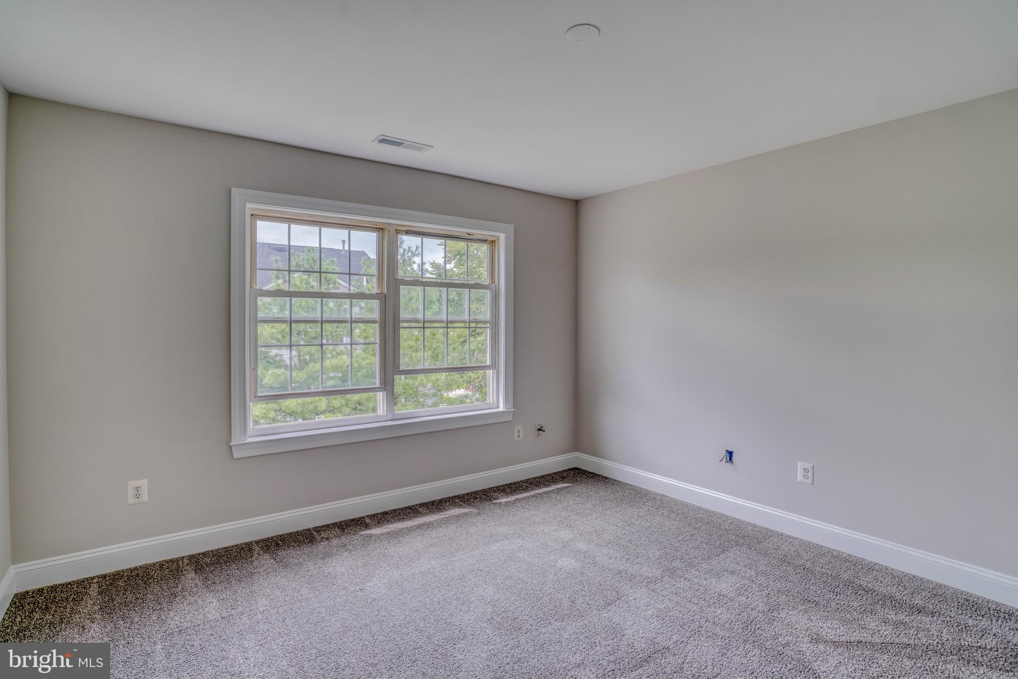 9902 Player Drive Philadelphia, PA 19115 - Photo 39 of 67 an empty room with a window