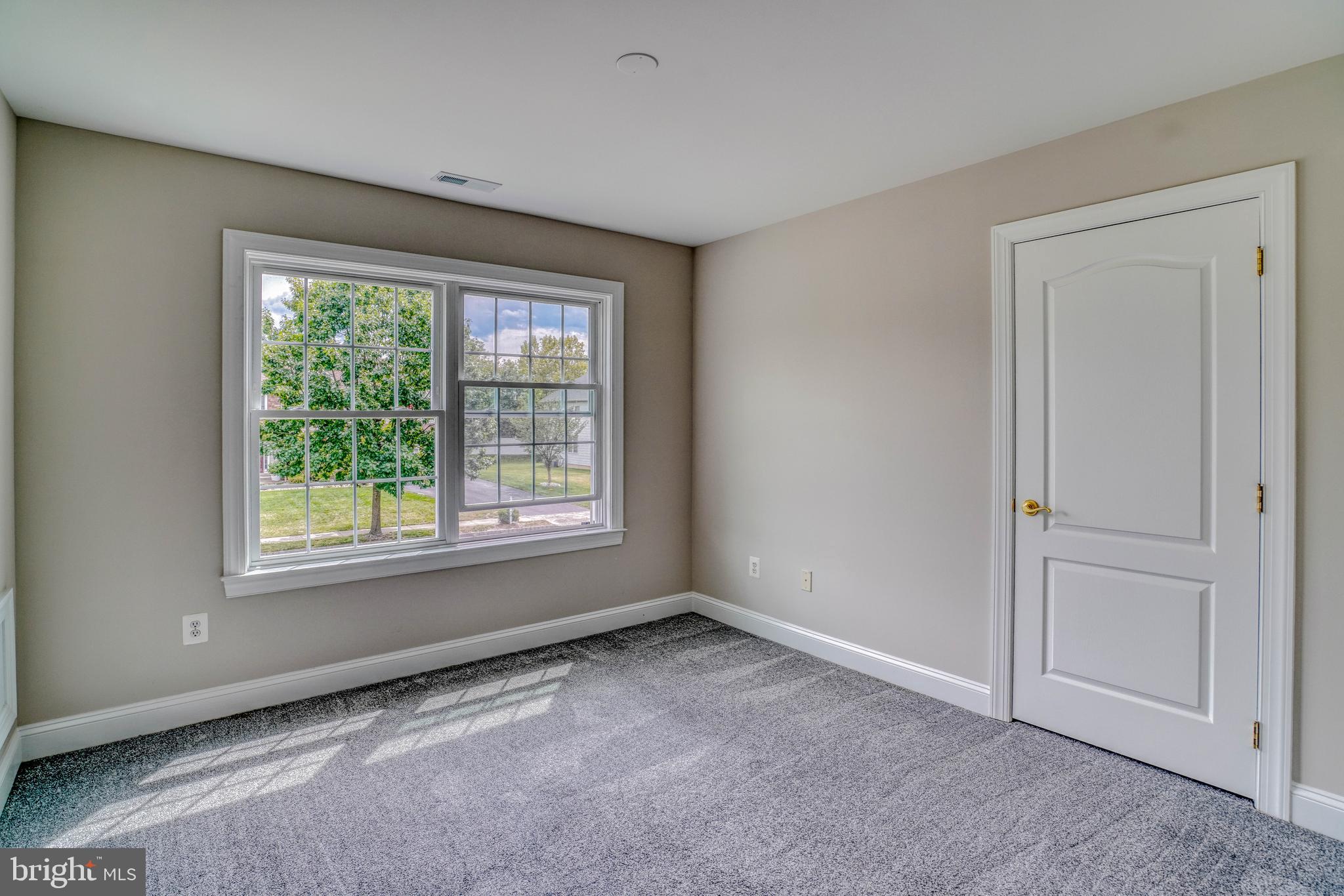 9902 Player Drive Philadelphia, PA 19115 - Photo 46 of 67 a view of an empty room with a window