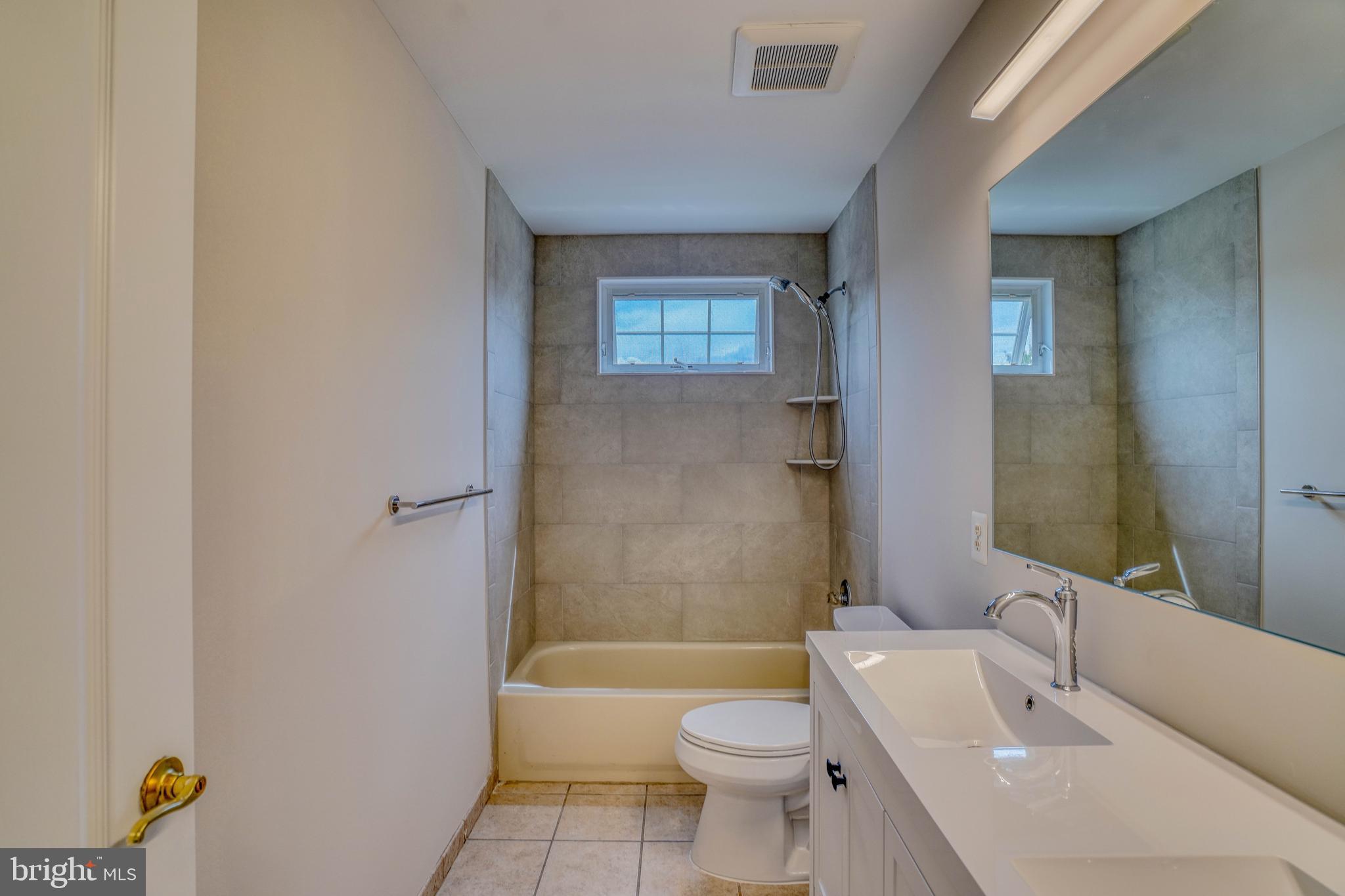 9902 Player Drive Philadelphia, PA 19115 - Photo 51 of 67 a bathroom with a toilet a sink and bathtub
