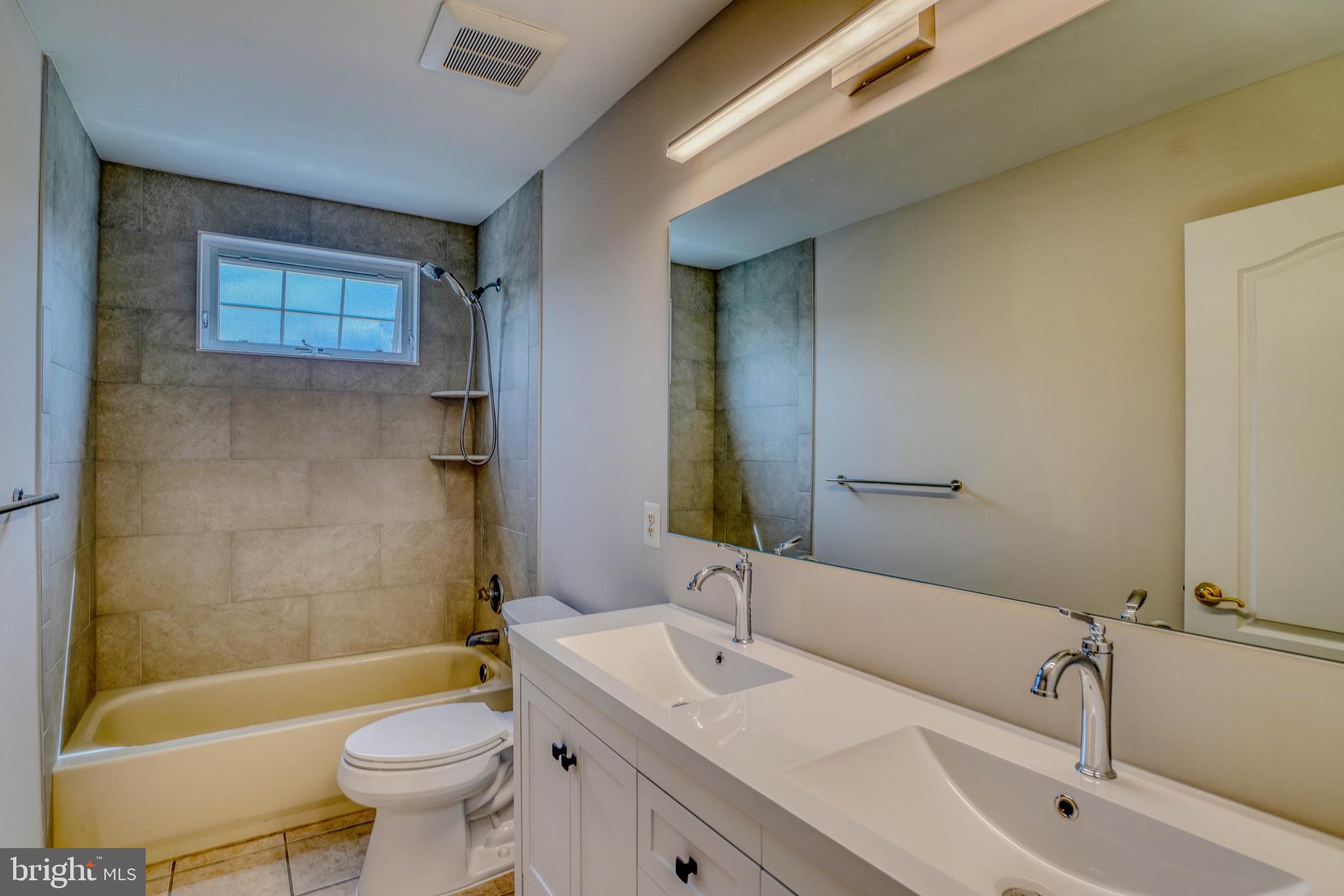 9902 Player Drive Philadelphia, PA 19115 - Photo 52 of 67 a bathroom with a sink a toilet and bathtub