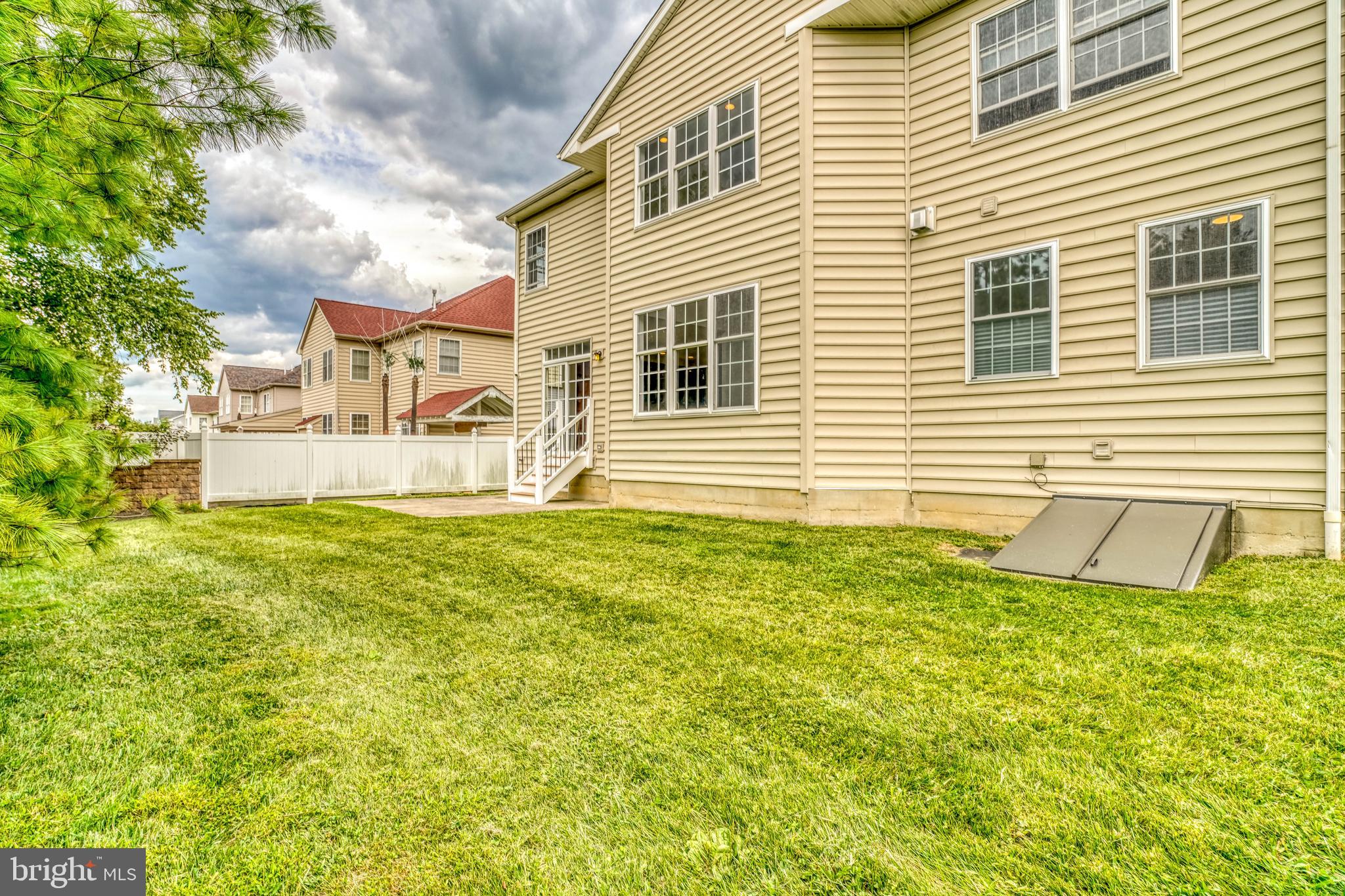 9902 Player Drive Philadelphia, PA 19115 - Photo 62 of 67 a front view of a house with a yard