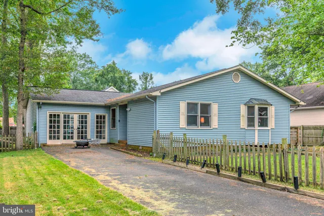 a front view of a house with a porch