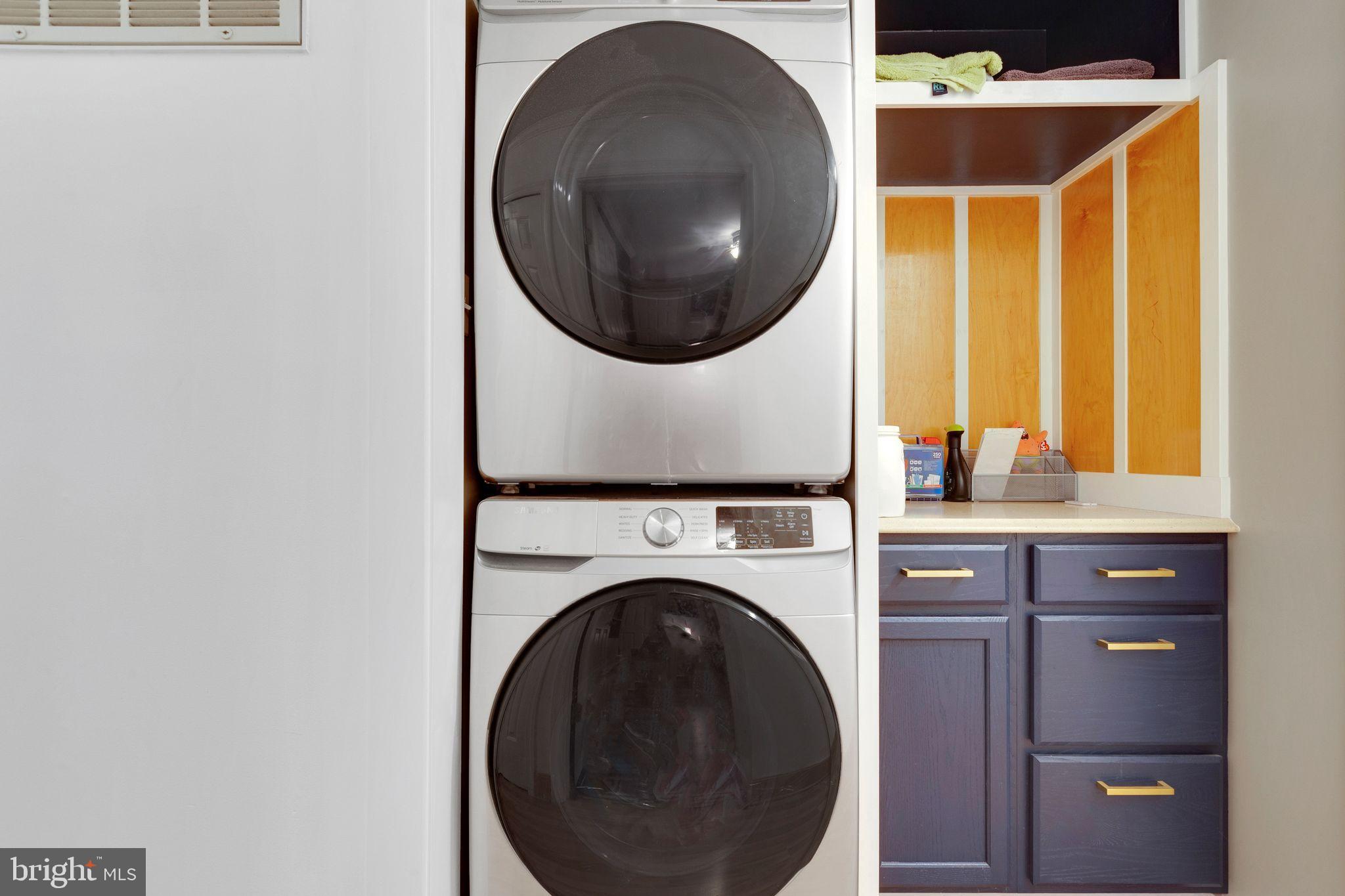 128 7th Street Colonial Beach, VA 22443 - Photo 24 of 32 a utility room with dryer and washer