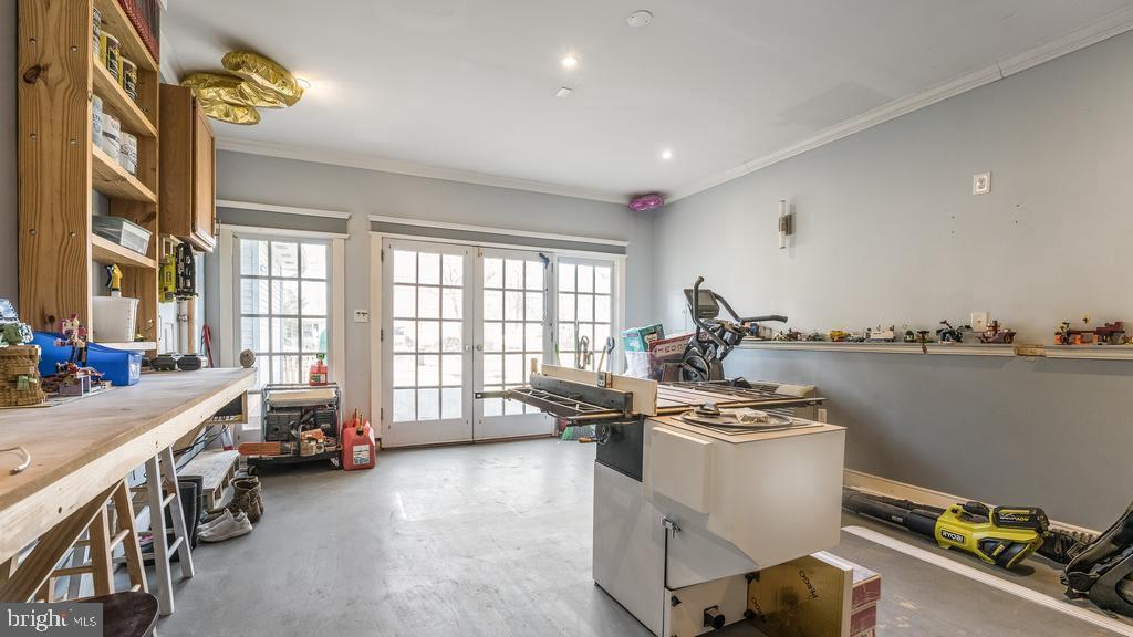 128 7th Street Colonial Beach, VA 22443 - Photo 31 of 32 a room with a bed furniture and a window