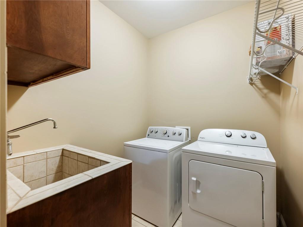 7657 Pea Ridge Road Lula, GA 30554 - Photo 27 of 76 a utility room with dryer and washer