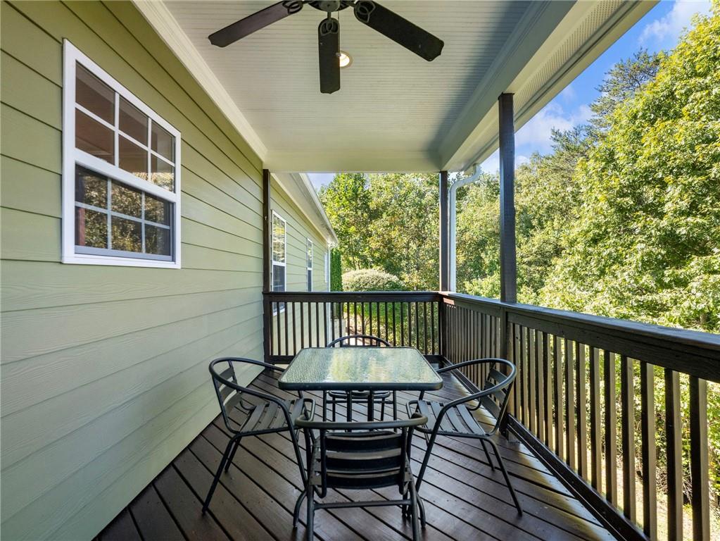 7657 Pea Ridge Road Lula, GA 30554 - Photo 40 of 76 a view of a balcony with furniture