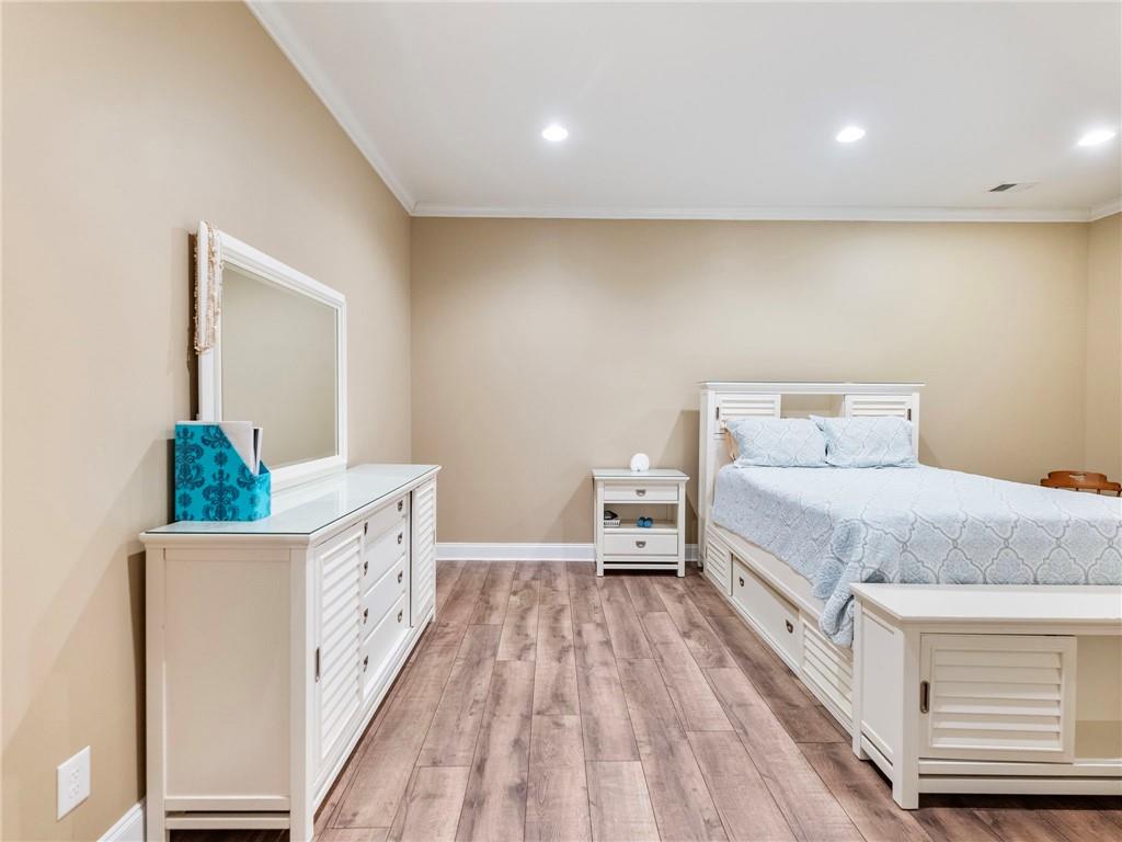 7657 Pea Ridge Road Lula, GA 30554 - Photo 50 of 76 a spacious bedroom with a bed and a window