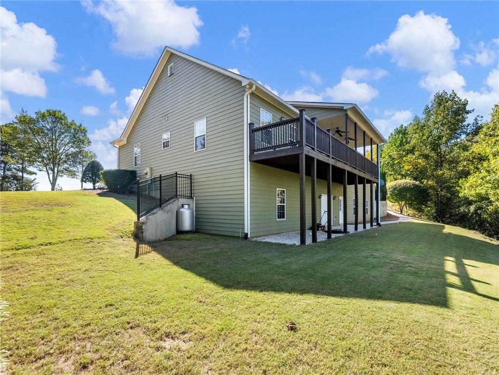 7657 Pea Ridge Road Lula, GA 30554 - Photo 62 of 76 a view of a house with a yard