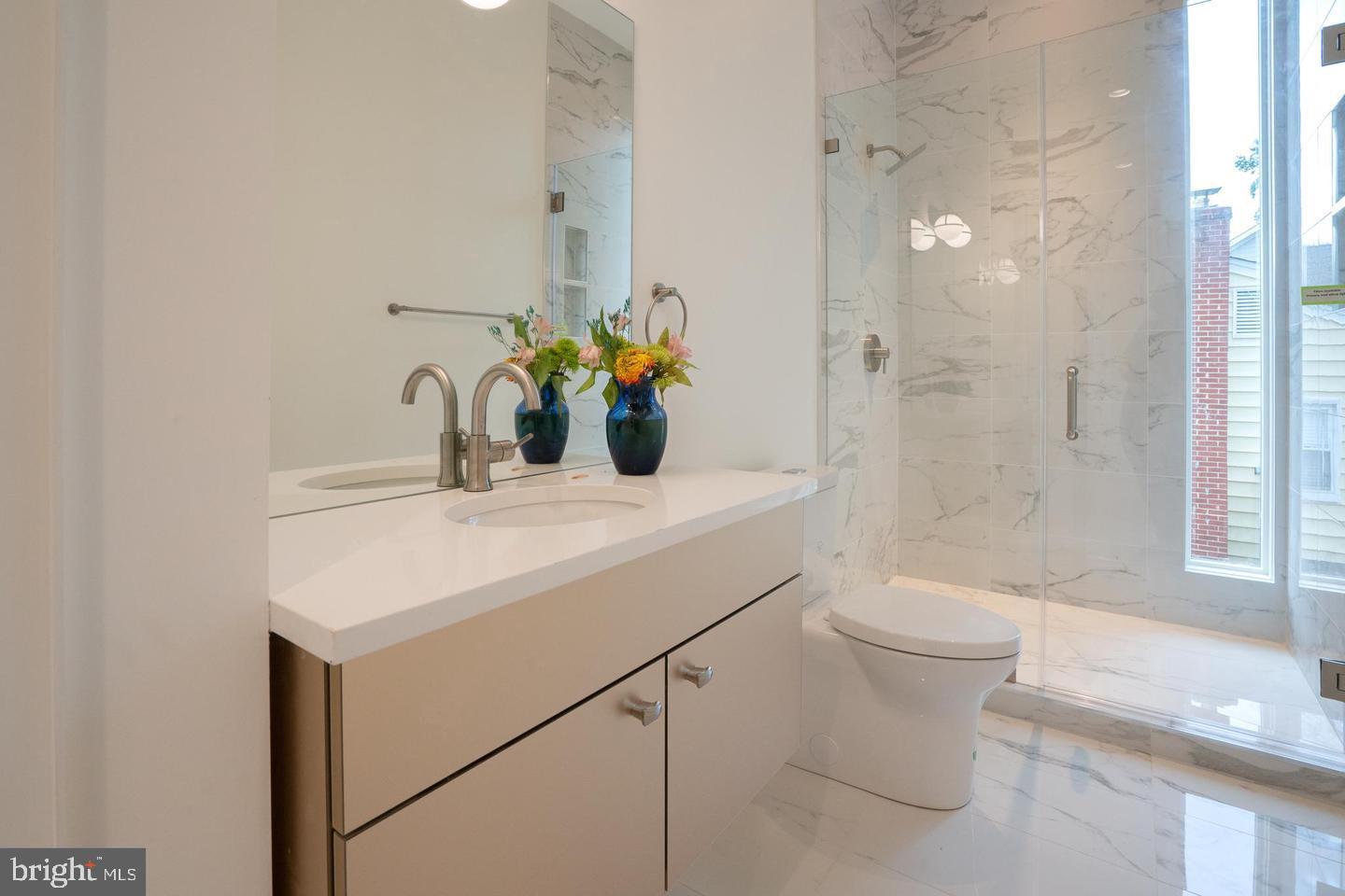 110 Tapawingo Road Southwest Vienna, VA 22180 - Photo 10 of 69 Main level bath with custom vanity