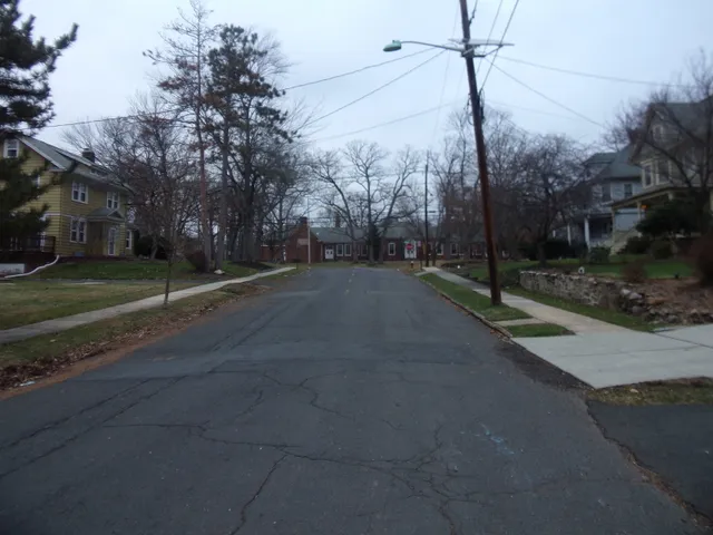 a view of a road with a yard