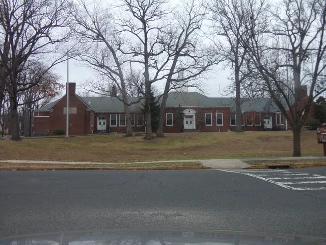 a view of house with trees in the background