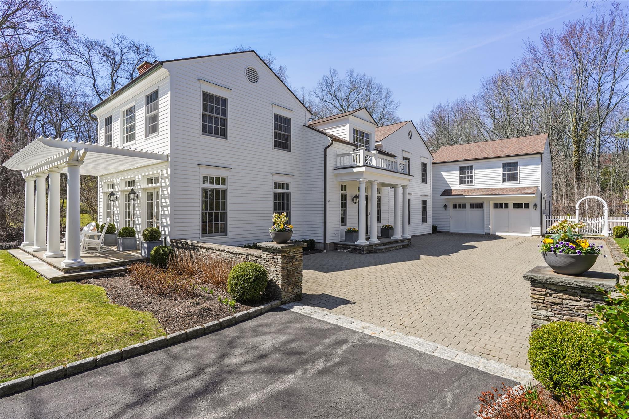 19 Beverly Road Purchase, NY 10577 - Photo 1 of 1 a front view of a house with garden