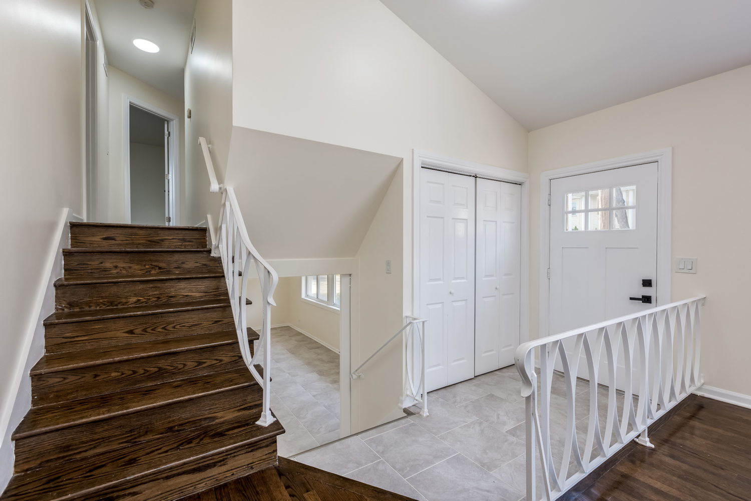 8717 Gross Point Road Skokie, IL 60077 - Photo 26 of 36 a view of entryway and hall with wooden floor
