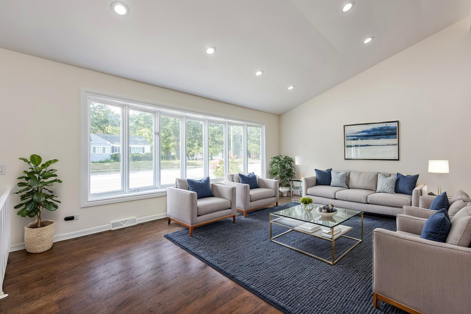 8717 Gross Point Road Skokie, IL 60077 - Photo 3 of 36 a living room with furniture and a large window