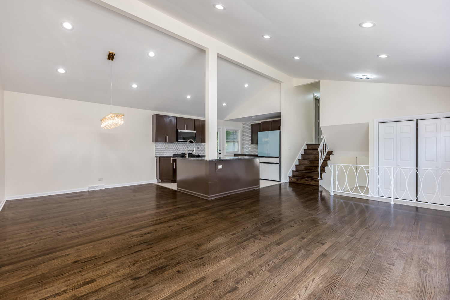 8717 Gross Point Road Skokie, IL 60077 - Photo 6 of 36 a view of kitchen with cabinets and wooden floor