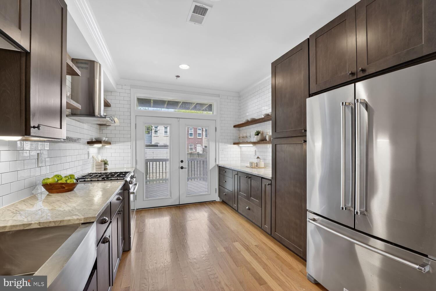 131 P Street Northwest Washington, DC 20001 - Photo 10 of 24 Modern kitchen with sleek finishes.