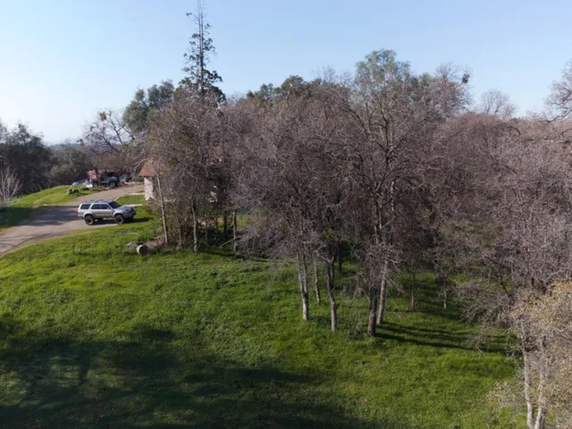 a view of a house with a big yard