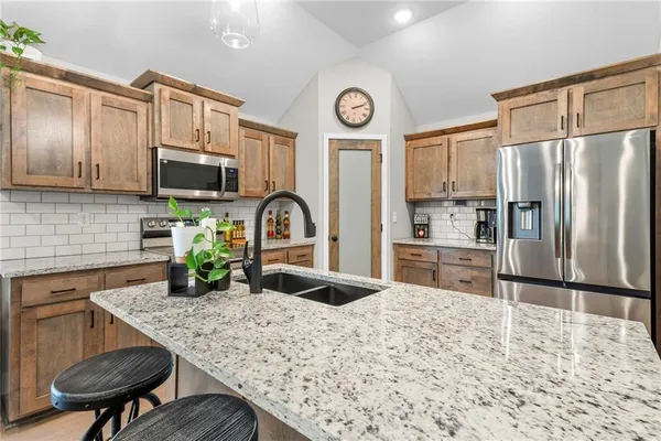 $430,000 | 1404 Northwest Maple Drive, Grain Valley, MO 64029