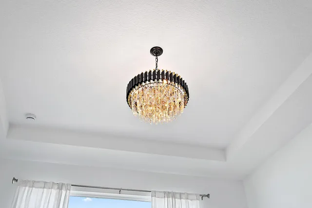 a bathroom with double vanity sinks and a mirror