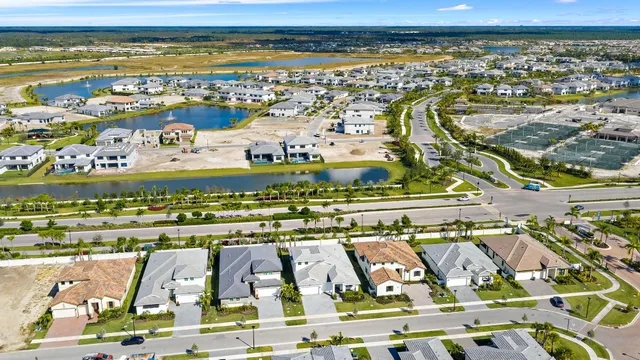 an aerial view of a house with a swimming pool