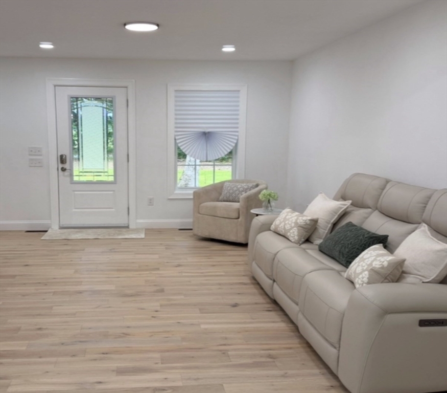 22 Root Road Westfield, MA 01085 - Photo 8 of 23 a living room with furniture and a window