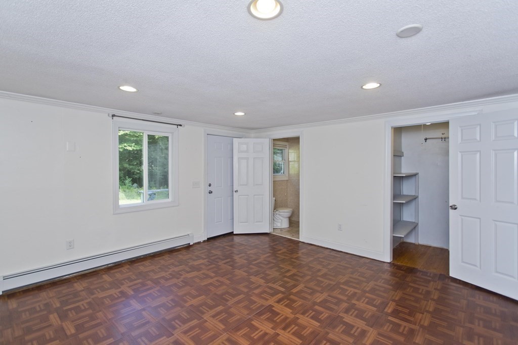 27 Searle Road Huntington, MA 01050 - Photo 14 of 32 a view of an empty room with a window