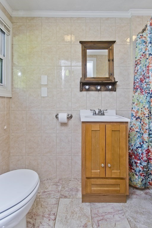 27 Searle Road Huntington, MA 01050 - Photo 17 of 32 a bathroom with a toilet a sink and mirror