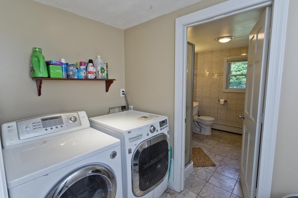 27 Searle Road Huntington, MA 01050 - Photo 21 of 32 a view of washer and dryer in a room