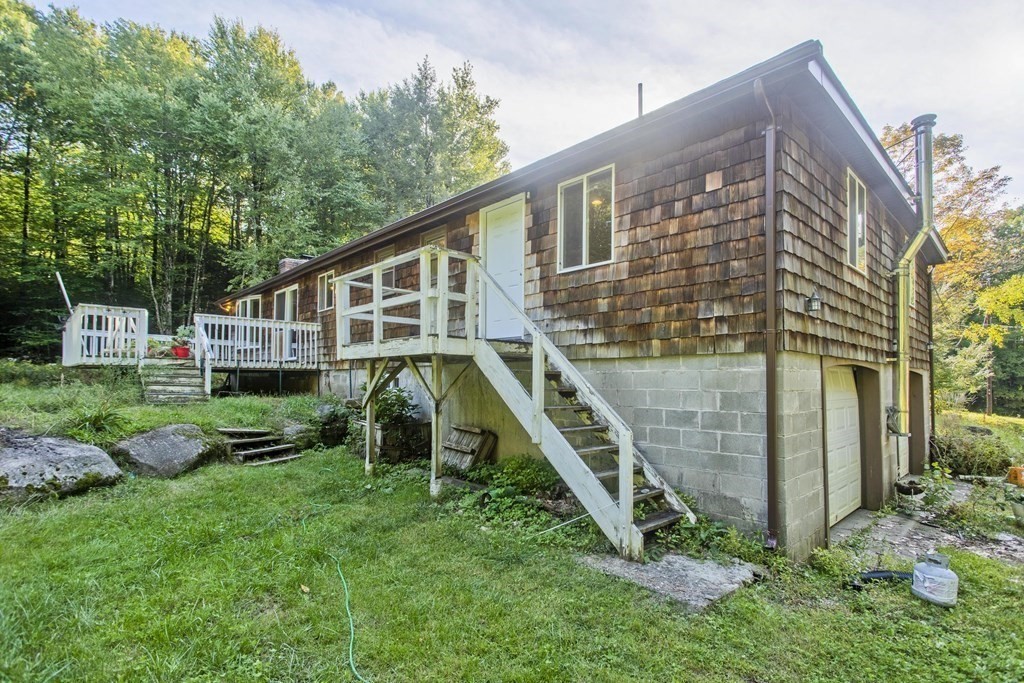 27 Searle Road Huntington, MA 01050 - Photo 28 of 32 a view of a house with a backyard