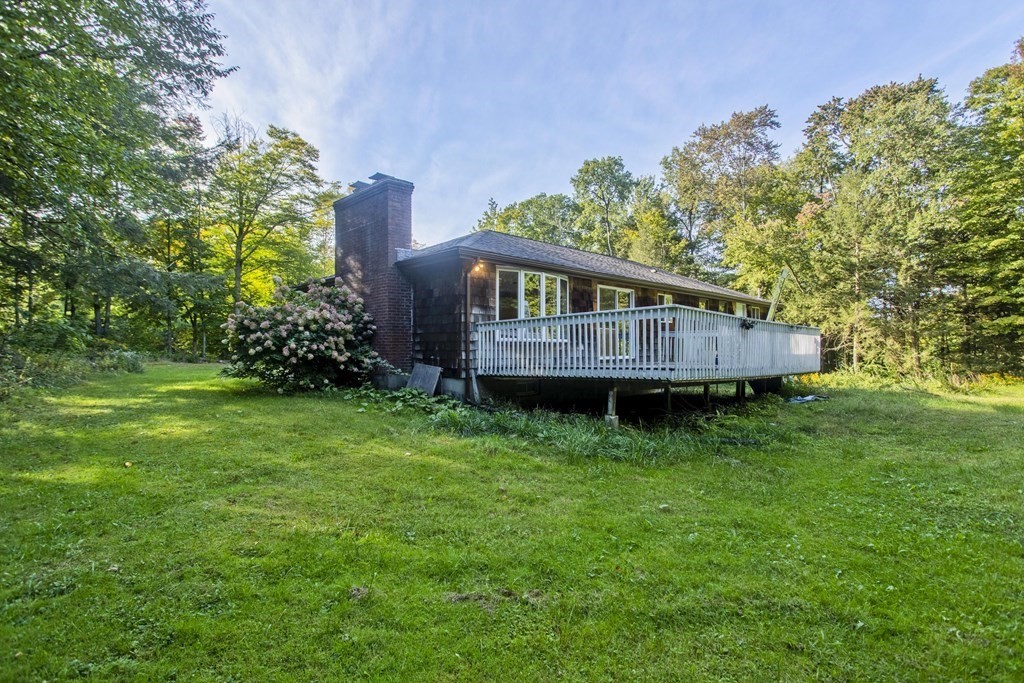 27 Searle Road Huntington, MA 01050 - Photo 30 of 32 a view of a house with a yard