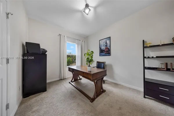 a room with furniture and window