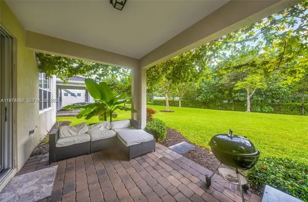 a view of a deck with a yard