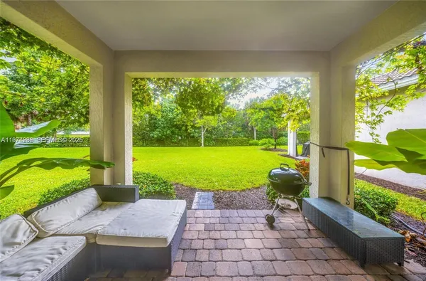 a view of a garden with a fountain