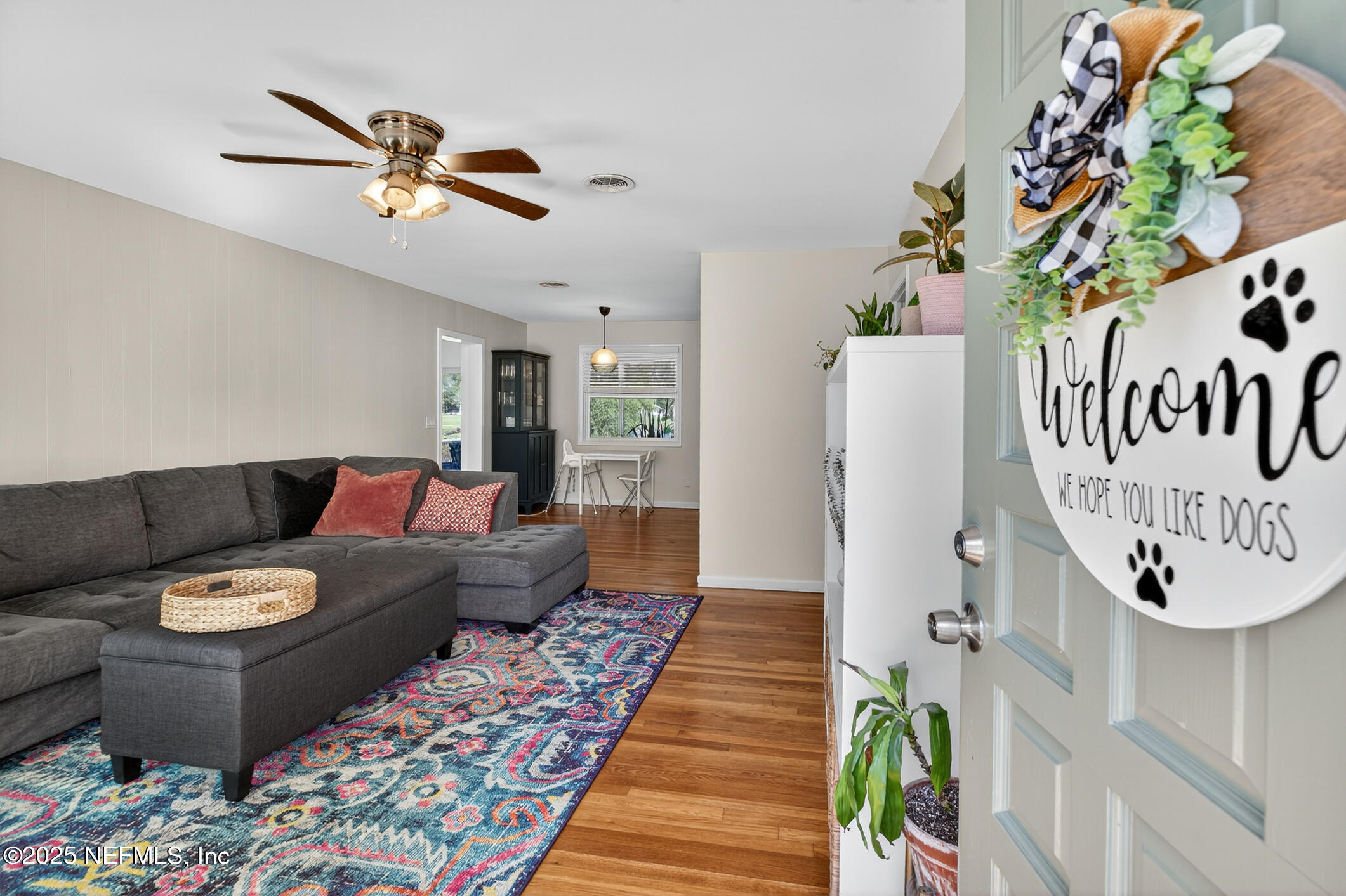 7470 Spinola Road Jacksonville, FL 32217 - Photo 13 of 76 a living room with furniture and a rug