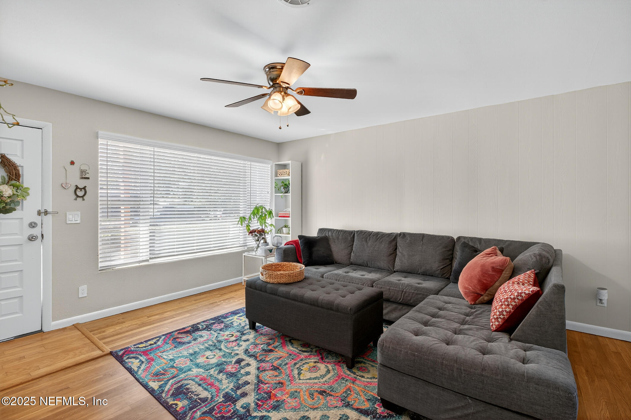 7470 Spinola Road Jacksonville, FL 32217 - Photo 15 of 76 a living room with furniture and a window